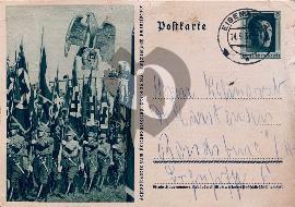 Recto carte postale défilé SA avec drapeaux dague et statue de l'Aigle à Nuremberg, timbre Hitler