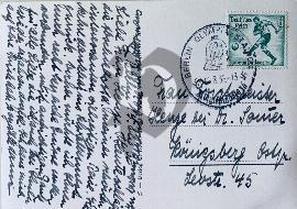 Verso carte postale utilisé avec tampon rond Berlin Olympia 1936 avec la cloche olympique et timbre des jo Footballeur