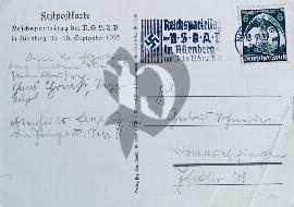 Verso carte postale utiliséé tampon reichsparteitag timbre reichsparteitag avec aigle et vu sur le chateau ainsi qu'un tampon rond de la ville Nuremberg 1935